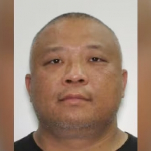 全国通缉华裔男子胡志雄，涉嫌杀害万锦市地产经纪梅玉英